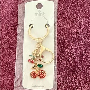 Mint Cherry Keychain with Red and Gold Details